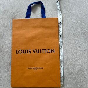 100% authentic medium Louis Vuitton shopping bag